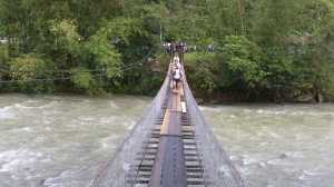 Crossing the suspension bridge from the bus drop off to the Start area.  Only 5 people allowed on the bridge at a time.